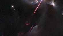 Опубликована фотография протозвезды, выпускающей джет сквозь газовое облако